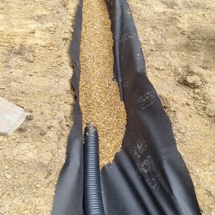 Pipe leading into sharp sand files membrane